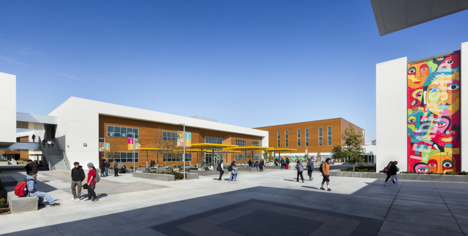 Photo of students using the courtyard of Logan Memorial Educational Campus.