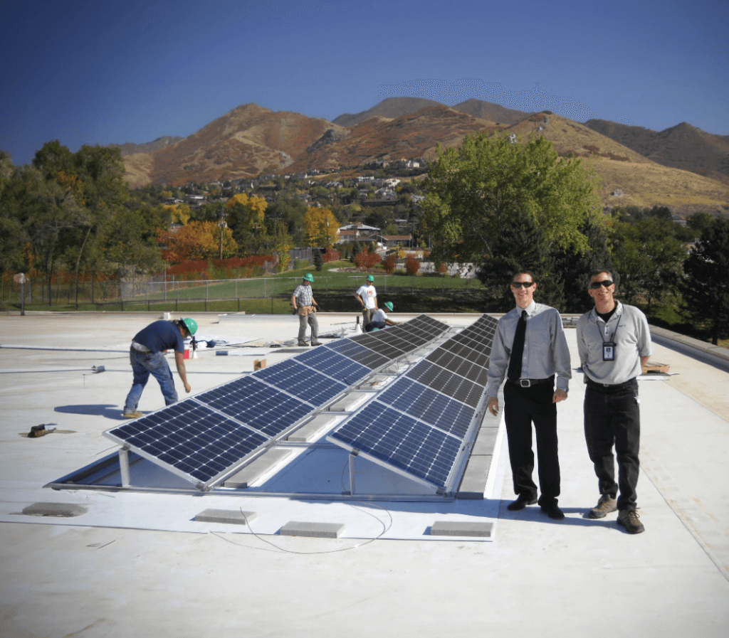 Installation of solar panels on a school building in Salt Lake City, UT.