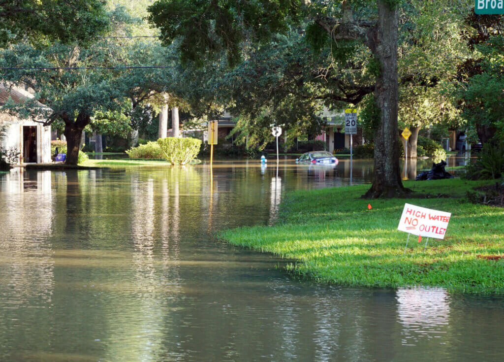 Flooded streets of a neighborhood, drowned cars. Consequences of Hurricane Harvey, Houston, Texas, US.